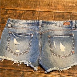 Distressed denim shorts